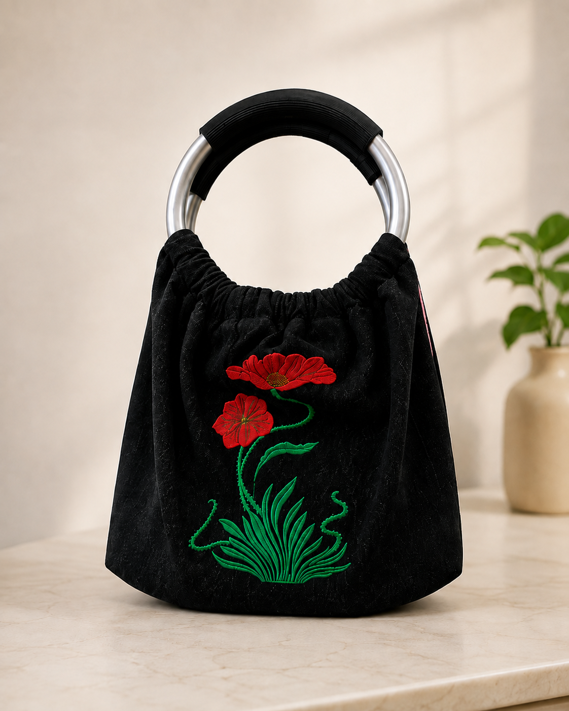 Black embroidered flower bag